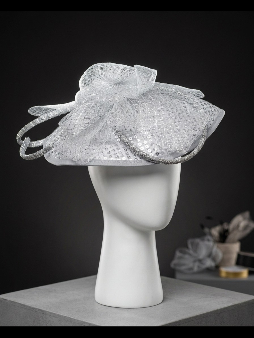 Elegant White Fascinator Hat with Bow Accent